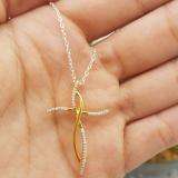 0.12 Carat (ctw) 14K Yellow Gold Round White Diamond Ladies Cross Pendant