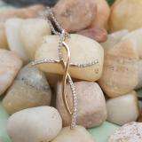 0.12 Carat (ctw) 18K Rose Gold Round White Diamond Ladies Cross Pendant