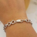 0.40 Carat (ctw) Sterling Silver Round Black & White Diamond Ladies Infinity Tennis Link Bracelet