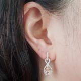 1.80 Carat (ctw) 10K Rose Gold Pear Cut Morganite & Round Cut White Diamond Ladies Infinity Swirl Dangling Drop Earrings