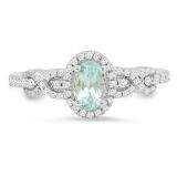 0.70 Carat (ctw) 10K White Gold Oval Cut Aquamarine & Round Cut White Diamond Ladies Bridal Halo Engagement Ring 3/4 CT