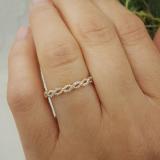 0.06 Carat (ctw) 14K Rose Gold Round Cut Diamond Ladies Bridal Anniversary Wedding Band Stackable Swirl Ring