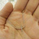 0.05 Carat (ctw) Dainty Sterling Silver Round White Diamond Ladies Sideways Religious Cross Pendant (Silver Chain Included)