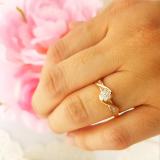 0.25 Carat (ctw) 14K Rose Gold Round & Baguette Cut White Diamond Bridal Cluster Flower Engagement Ring 1/4 CT