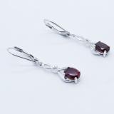 2.10 Carat (Ctw) Sterling Silver Oval Cut Garnet & Round Cut White Diamond Ladies Infinity Swirl Dangling Drop Earrings