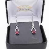 2.10 Carat (Ctw) Sterling Silver Oval Cut Garnet & Round Cut White Diamond Ladies Infinity Swirl Dangling Drop Earrings