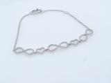 0.25 Carat (ctw) Round White Diamond Studded Infinity & Heart Ladies Bracelet 1/4 CT 14K White Gold