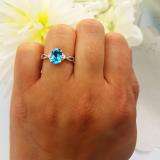 1.50 Carat (ctw) Sterling Silver Oval Cut Blue Topaz & Round Diamond Ladies Engagement Ring 1 1/2 CT