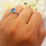 1.50 Carat (ctw) Sterling Silver Oval Cut Blue Topaz & Round Diamond Ladies Engagement Ring 1 1/2 CT