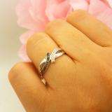 0.06 Carat (ctw) Sterling Silver Round Black And White Diamond Ladies Bypass Promise Engagement Ring