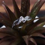 0.15 Carat (ctw) Sterling Silver Round White Diamond Crossover Swirl Bypass Ladies Promise Ring