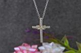 0.06 Carat (ctw) 14K Yellow Gold Round White Diamond Ladies Cross Pendant (Silver Chain Included)