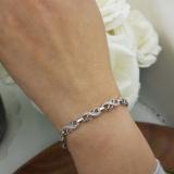 0.25 Carat (ctw) Sterling Silver Round White Diamond Ladies Infinity Tennis Link Bracelet 1/4 CT