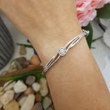0.04 Carat (ctw) Sterling Silver Round Cut White Diamond Ladies Twisted Bangle Bracelet