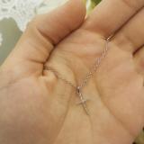 0.06 Carat (ctw) 14K White Gold Round Diamond Ladies Cross Pendant (Silver Chain Included)