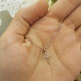 0.06 Carat (ctw) 18K Rose Gold Round Diamond Ladies Cross Pendant (Silver Chain Included)