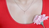 0.15 Carat (ctw) 10K Yellow Gold Round Diamond Ladies Cross Pendant (Silver Chain Included)