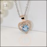 18K Rose Gold 5 MM Heart Blue Topaz & Round White Diamond Ladies Halo Heart Shape Pendant