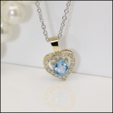 18K Yellow Gold 5 MM Heart Blue Topaz & Round White Diamond Ladies Halo Heart Shape Pendant