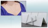 0.06 Carat (ctw) Sterling Silver Round Diamond Sideways Religious Cross Ladies Pendant