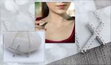 0.06 Carat (ctw) Sterling Silver Round Diamond Sideways Religious Cross Ladies Pendant