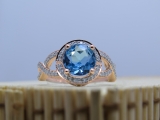 10K Rose Gold 8 MM Round Blue Topaz & White Diamond Ladies Split Shank Engagement Ring