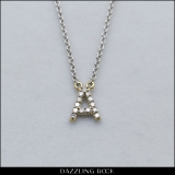 0.12 Carat (ctw) 14K Yellow Gold Diamond Uppercase Letter A Initial Pendant (Silver Chain Included)