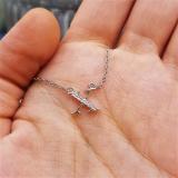 0.05 Carat (ctw) Round Diamond Lowercase Letter 'x' Initial Pendant 10K White Gold