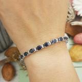 Sterling Silver 6X4 MM Each Oval Blue Sapphire & Round White Topaz Ladies Tennis Bracelet