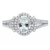 Sterling Silver 7X5 MM Oval Aquamarine & Round White Diamond Ladies Halo Style Engagement Ring