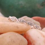 0.15 Carat (ctw) 10K White Gold Round Diamond Ladies Twisted Swirl Style Wedding Band