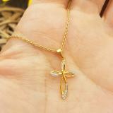 0.03 Carat (ctw) 10K Yellow Gold Round Diamond Ladies Cross Pendant (Silver Chain Included)