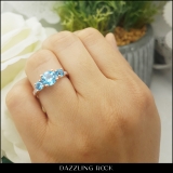 10K Rose Gold 7 MM Round Blue Topaz And Round White Diamond Ladies 3 Stone Engagement Ring