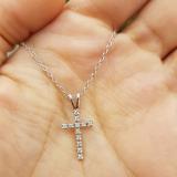 0.15 Carat (ctw) 10K White Gold Round Diamond Ladies Cross Pendant (Gold Chain Included)