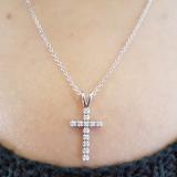 0.15 Carat (ctw) 10K White Gold Round Diamond Ladies Cross Pendant (Gold Chain Included)