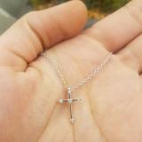 0.15 Carat (ctw) 10K White Gold Round Diamond Ladies Cross Pendant (Silver Chain Included)