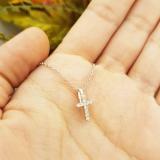 0.15 Carat (ctw) 10K White Gold Round White Diamond Ladies Cross Pendant (Silver Chain Included)