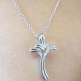 0.10 Carat (ctw) 10K White Gold Round Diamond Ladies Cross Heart Pendant 1/10 CT (Silver Chain)
