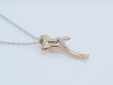 0.10 Carat (ctw) 18K Rose Gold Round Diamond Ladies Cross Heart Pendant 1/10 CT (Silver Chain)