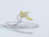 0.10 Carat (ctw) 18K Yellow Gold Round Diamond Ladies Cross Heart Pendant 1/10 CT (Silver Chain)