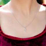 0.06 Carat (ctw) 10K White Gold Round White Diamond Ladies Cross Pendant (Gold Chain Included)
