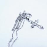 0.15 Carat (ctw) 10K White Gold Round Diamond Ladies Cross Pendant (Silver Chain Included)