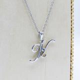 0.05 Carat (ctw) Sterling Silver Round Diamond Letter 'K' Initial Pendant (Silver Chain Included)