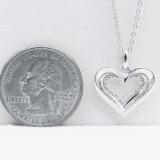 0.10 Carat (ctw) 10K White Gold Round Diamond Ladies Heart Pendant 1/10 CT (Silver Chain Included)