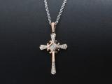 0.10 Carat (ctw) 10K Rose Gold Round White Diamond Cross Pendant 1/10 CT (Silver Chain Included)