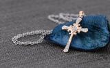 0.10 Carat (ctw) 14K Rose Gold Round White Diamond Cross Pendant 1/10 CT (Silver Chain Included)