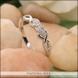 0.08 Carat (cttw) Round White Diamond Ladies Bridal Twisted Engagement Ring Sterling Silver