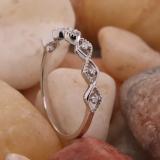 0.05 Carat (cttw) Round White Diamond Ladies Twisted Wedding Stackable Band 10K White Gold
