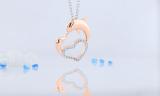 0.15 Carat (ctw) Round Diamond Ladies Dolphin Heart Pendant (Gold Chain Included) 18K Rose Gold