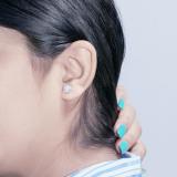 0.05 Carat (ctw) Round White Diamond Ladies Cushion Frame Knot Stud Earrings Sterling Silver